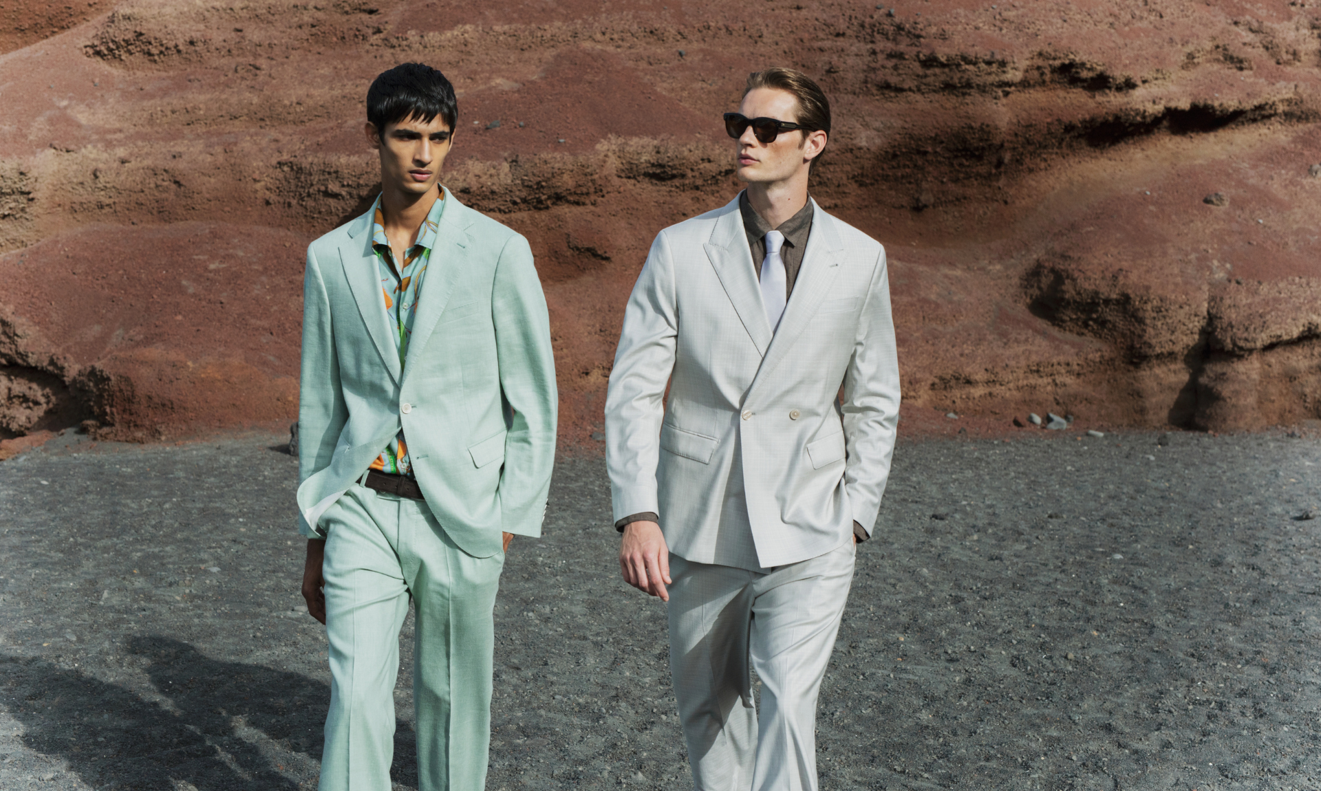 R.Brand Group Reference – Fashion campaign featuring two male models in premium menswear, representing modern style and international fashion expertise.